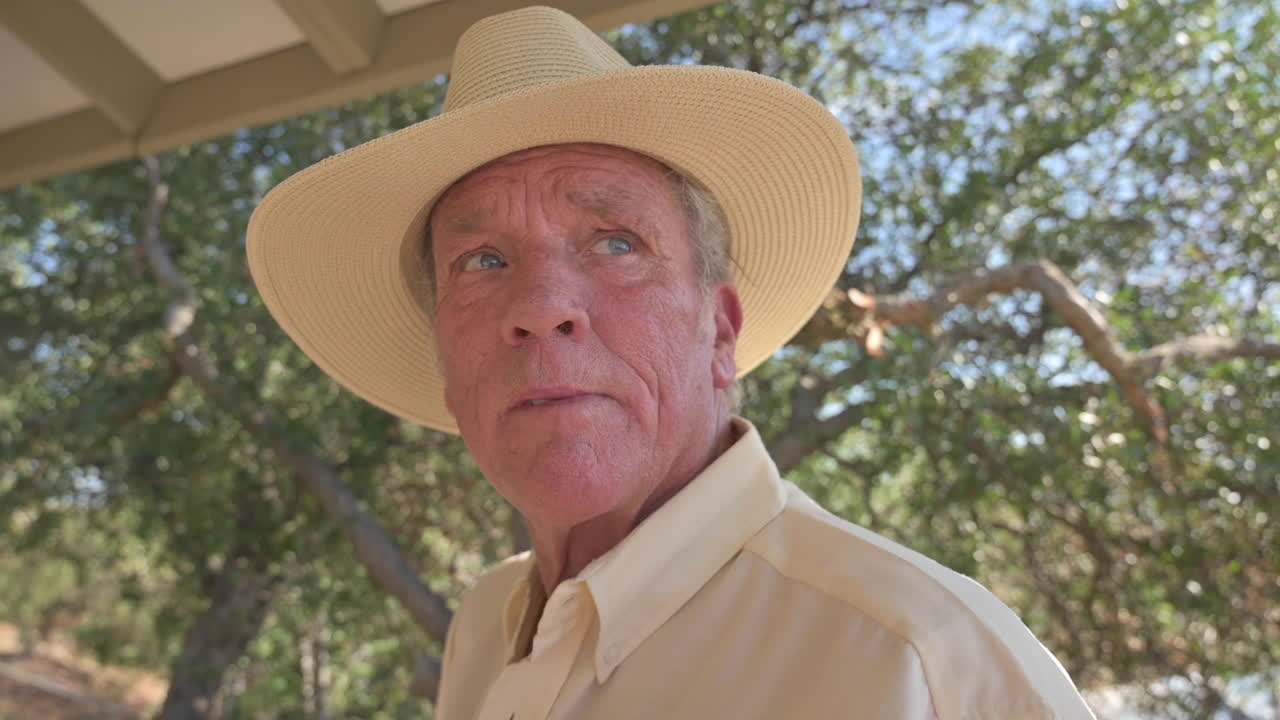 Low angle close-up shot of aged handsome male