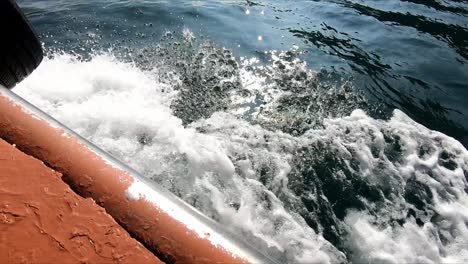 View-of-waves-hitting-the-boat-in-the-Khasab-sea,-boat-going-on-the-sea