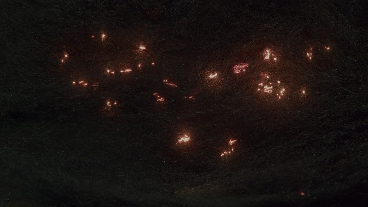 Burning steel wool demonstration close-up