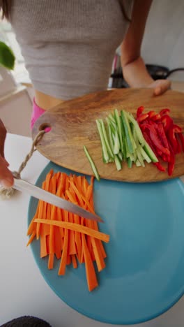 person chopping vegetables for a healthy meal