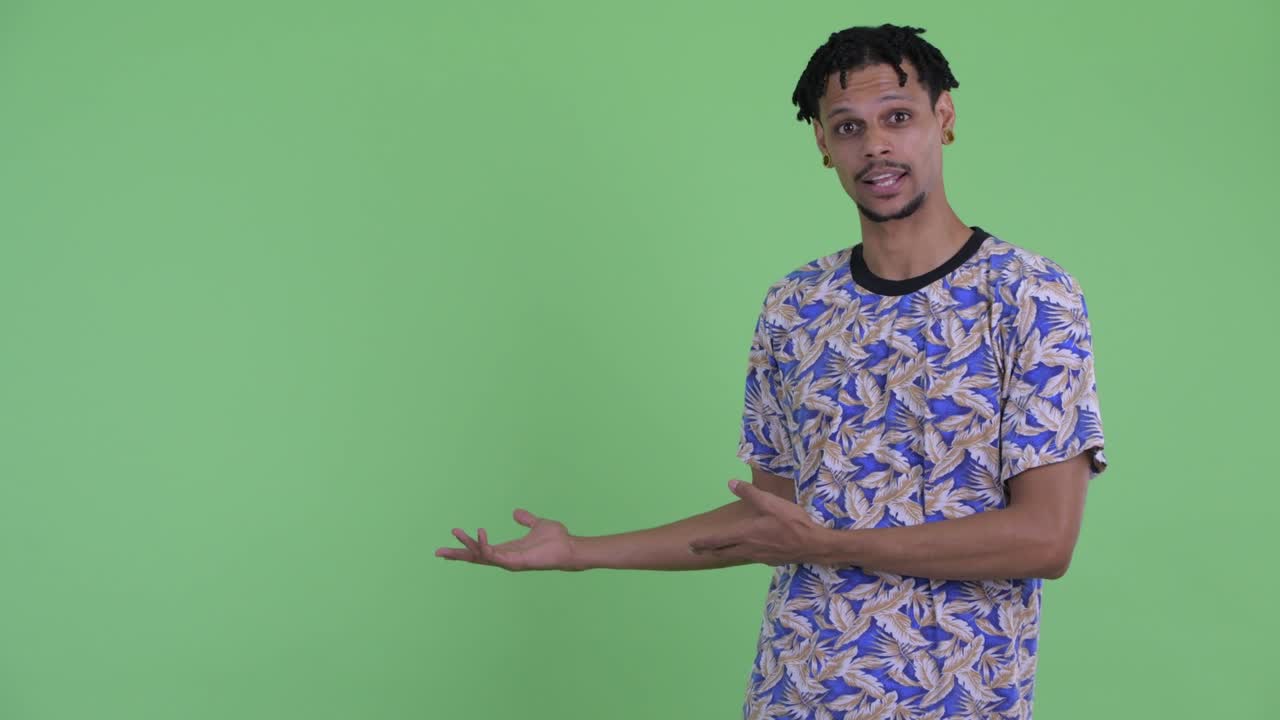 Young handsome African man with dreadlocks