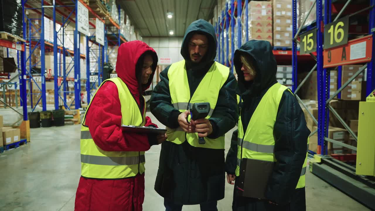 Warehouse Workers Inspecting Inventory