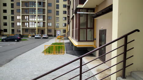 apartment building exterior with parking lot