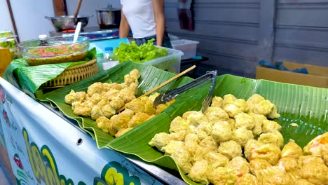 dim sum displayed at a vibrant market stall