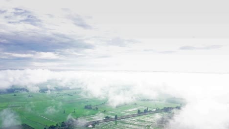 aerial view of cloudy sky high above the earth