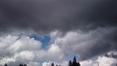 moving time lapse, hyperlapse of rolling storm clouds moving left to right, cumulonimbus