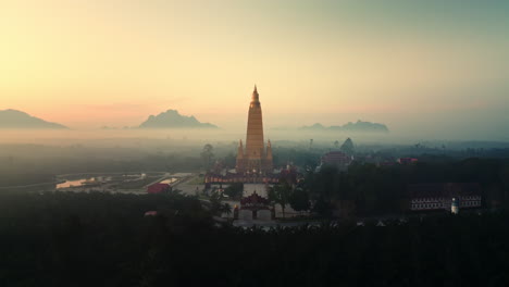 golden pagoda at sunrise, aerial view