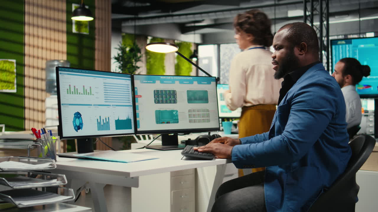 Vertical Video Black employee using data and technology for business management