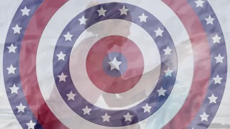 animation of circles coloured with flag of usa over african american woman