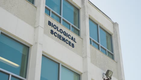 low-angle shot of biological sciences building sign at university of manitoba