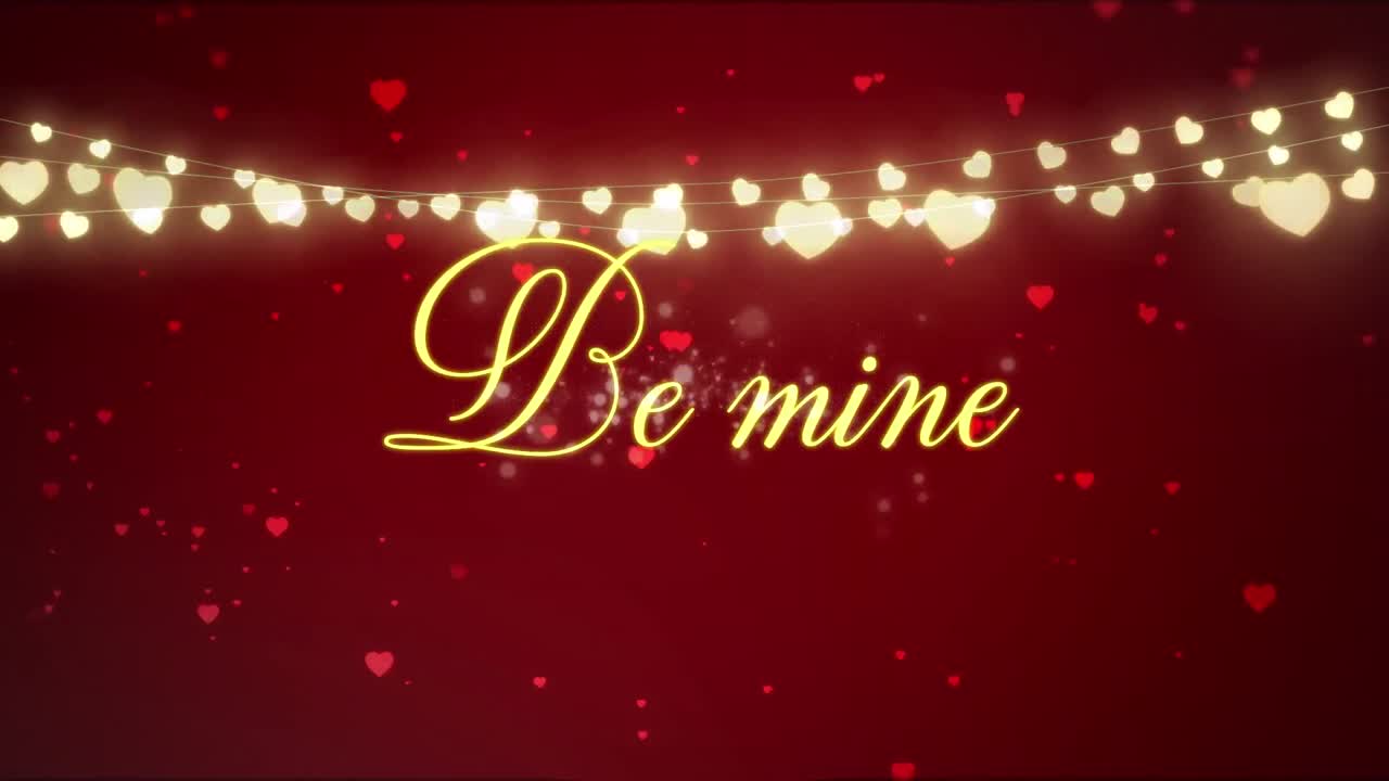 심장 위에 있는 "be mine" 문자의 애니메이션