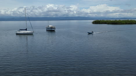 Static-handheld-shot-of-a-small-boat-returning-from-a-trip