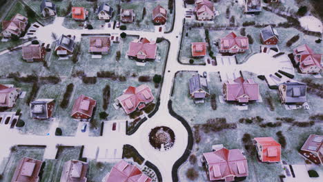 roundabout streets and luxury houses covered with snow in roompot arcen