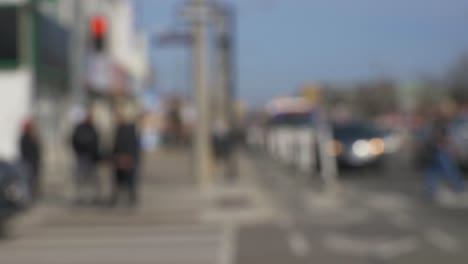 busy-local-traffic-intersection-ppl-walking-crossing-street