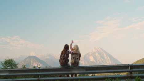 two women looking at view. two friends celebrating