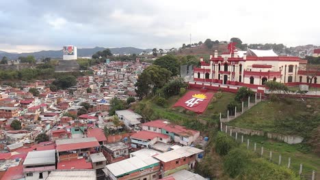 View-of-the-facade-of-Cuartel-4F-and-part-of-the-neighborhood,-located-in-the-popular-area-known-as-23-de-enero,-west-of-Caracas,-Venezuela