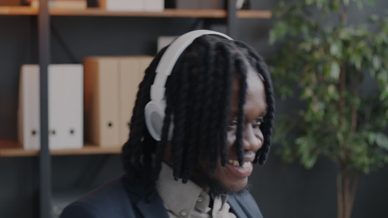 Happy Business Man Listening to Music