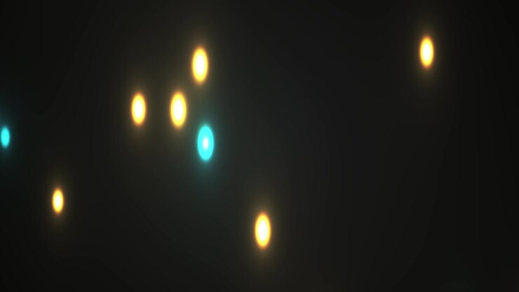 Sfere di luce astratte luminose gialle e blu che si muovono su sfondo scuro