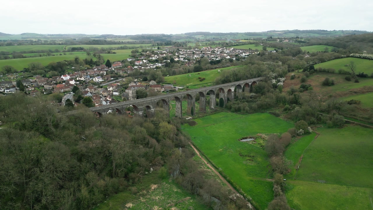 Slow wide angle drone view over Pensford Viaduct in Somerset, England