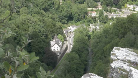 traffic in a riverside valley village. birds eye view, top view