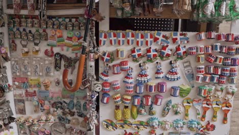 Colorful-Fridge-Magnets-For-Sale-On-Market-In-Downtown-At-El-Conde,-Zona-Colonial-Of-Santo-Domingo,-Dominican-Republic