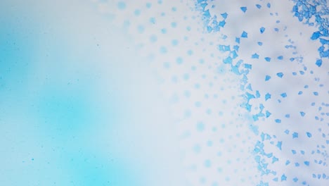 abstract blue ink flowing in macro, dreamy and soft artistic texture in motion