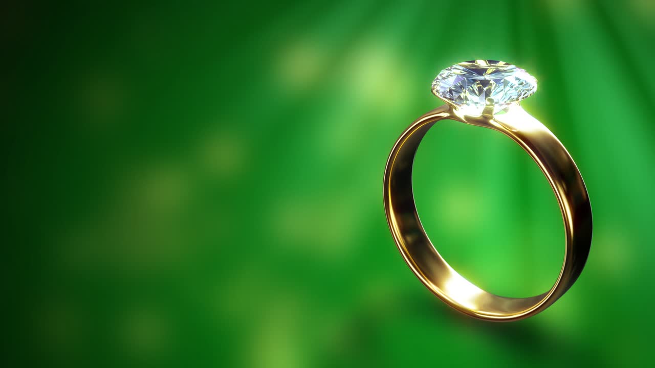 lighting diamond engagement ring rotates on green backdrop