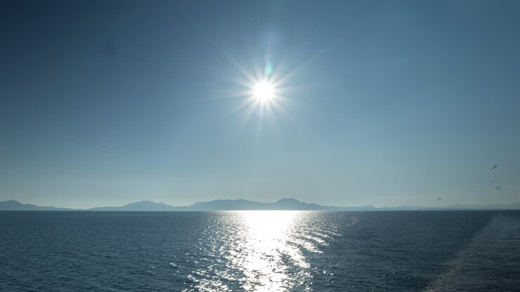 sea and sun from a moving boat