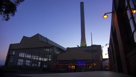 Wide-shot-of-a-large-warehouse-or-factory-at-dusk-or-sunset-2