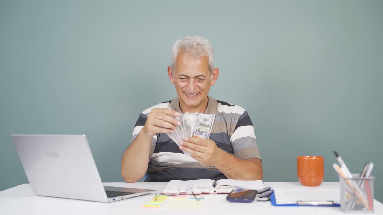 Man distributing banknotes and tossing them into the air.