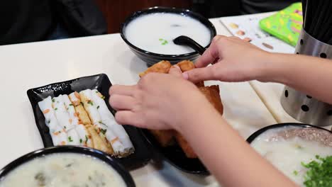 eating dim sum in a restaurant