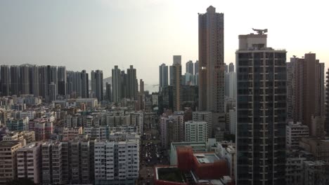 A-sideways-drone-shot-of-tall-buildings-in-Hong-Kong