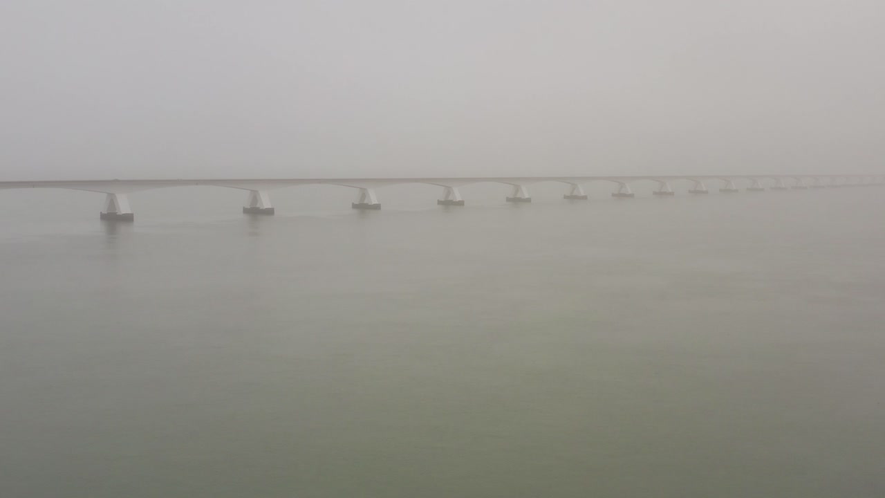 Drone shot of the Zeelandbridge during thick dog