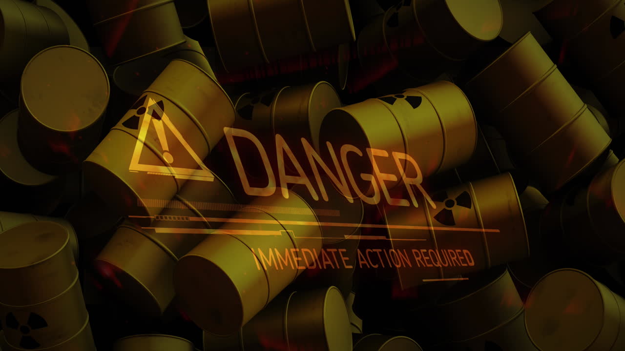 방사능 기호를 가진 배럴 위의 위험 텍스트의 애니메이션