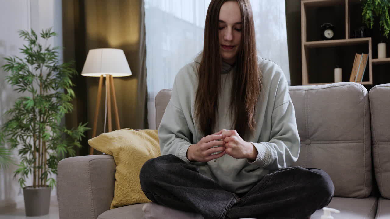 Woman scratching her hands