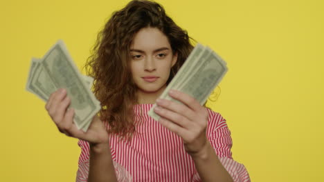 young woman counting cash money