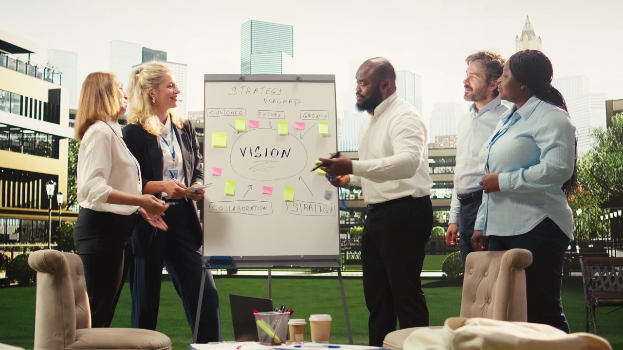 Diverse Business Team Collaborating on Strategy Roadmap in Modern Office
