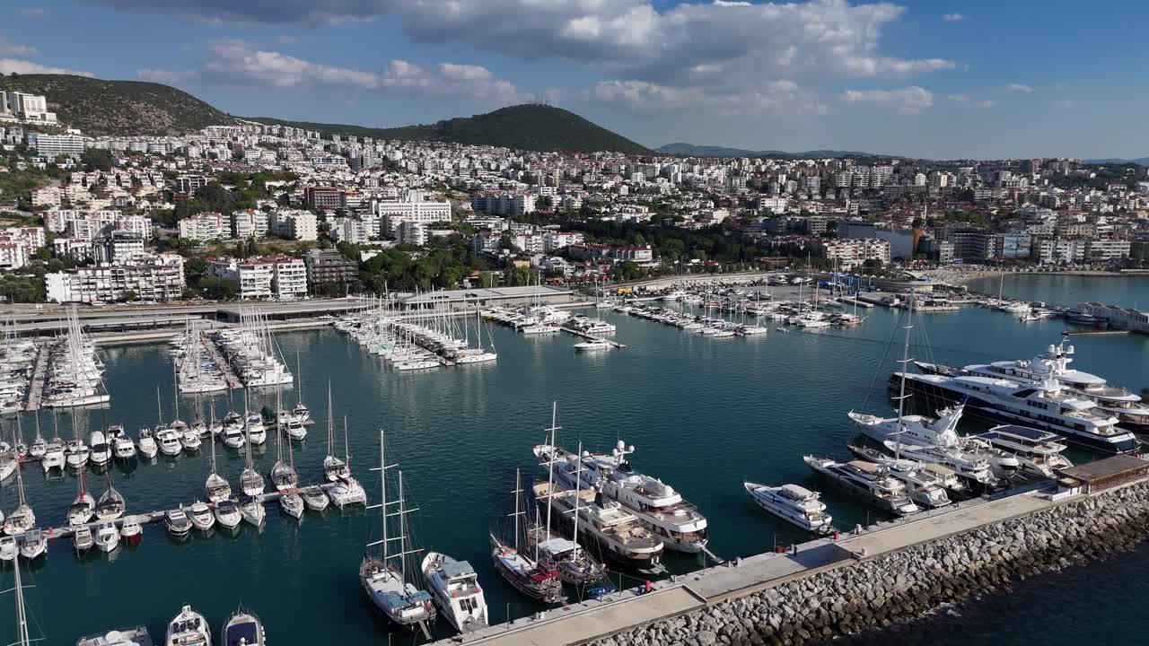 west to east aerial cityscape of the gorgeous port in Kusadasi, Turkey