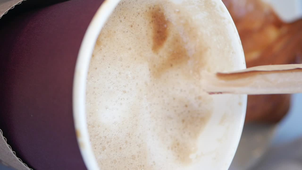 Coffee Latte in Paper Cup with Croissant