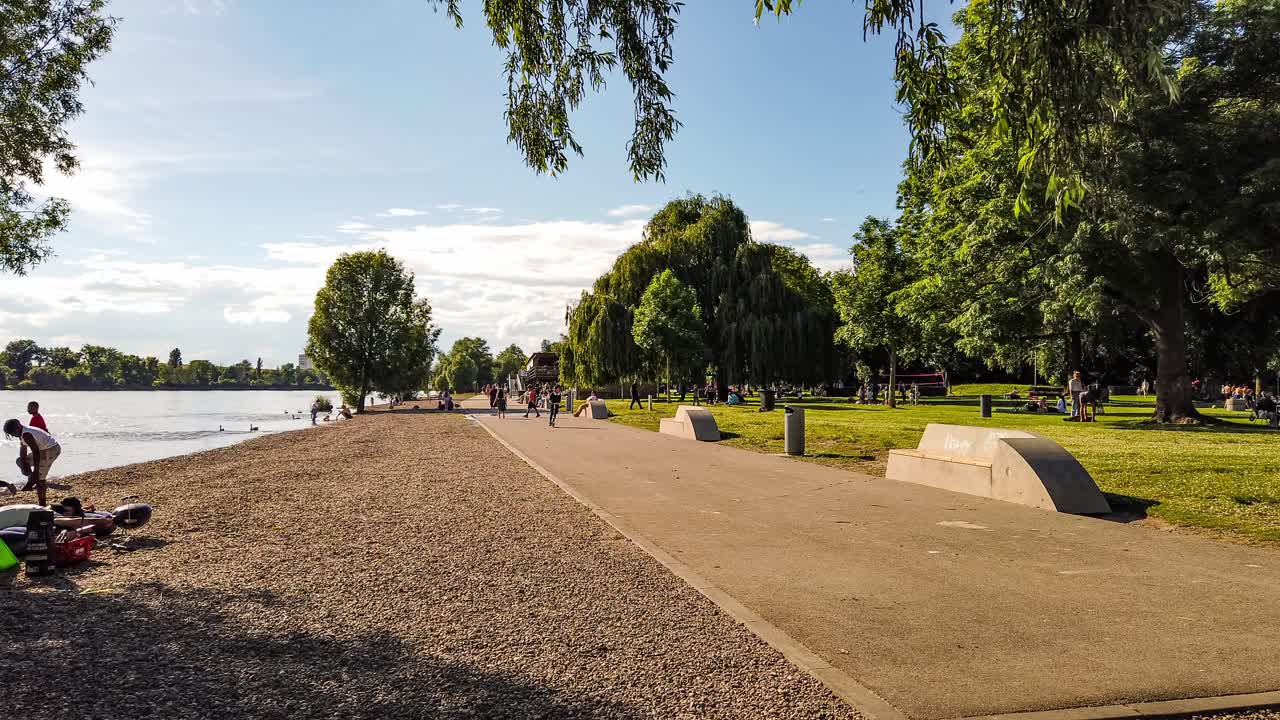 People enjoying a Sunny Summer Day in City Park, Motion Time Lapse