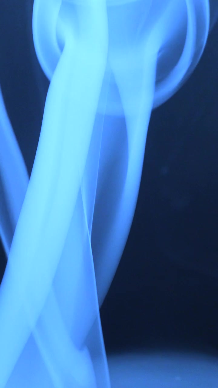 Mystical Blue Smoke Swirling in Dark Environment