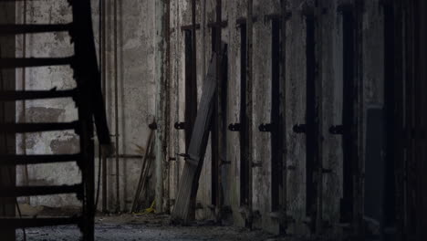 decrepit prison cells and staircase