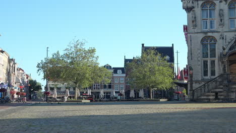 town hall building and the central market square of gouda, netherlands - wide