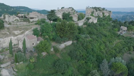 aerial drone luberon provence saignon france medieval town church at sunrise