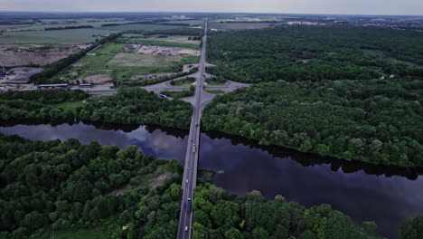 aerial view of the bridge and the road over the river