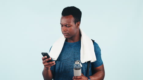 Happy-black-man,-fitness-and-phone-in-winning