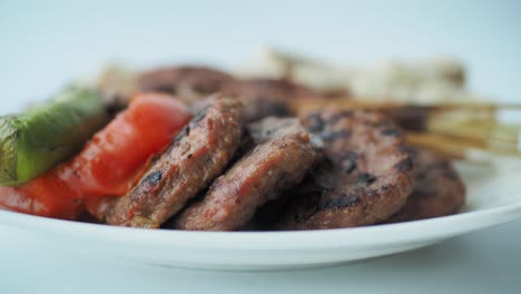 grilled turkish kofta with vegetables