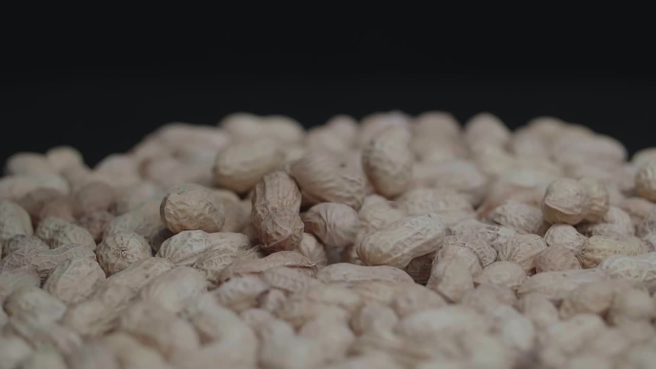 Peanuts Falling Into a Pile
