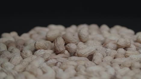 peanuts falling into a pile