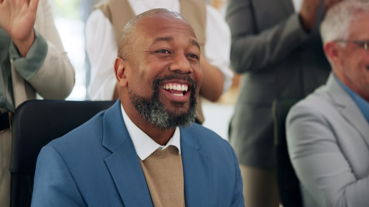 Happy African American Businessman Smiling and Applauding in Office Meeting